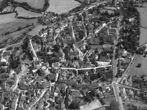 <figcaption style="line-height: 1em;"><i class="fas fa-tint"></i><span style="font-size: 11px;"> <b>Fig. 1. </b>
Vue aérienne de la ville haute du nord-ouest. © A. Béguin, 2003, DAO S. Balcon-Berry.<br>
<b>1.</b> Tracé de l’enceinte réduite. <b>2 et 3.</b> Vestiges de tours polygonales. <b>4.</b> Emplacement des fossés. <b>5.</b> Cathédrale Saint-Lazare. <b>6.</b> Emplacement de la porte des Bancs. <b>7. </b>Palais épiscopal. <b>8.</b> Emplacement de Saint-Nazaire (cour de la Maîtrise). <b>9.</b> Emplacement du cloître canonial (cour du Chapitre).</span></figcaption> Fig. 1. Autun