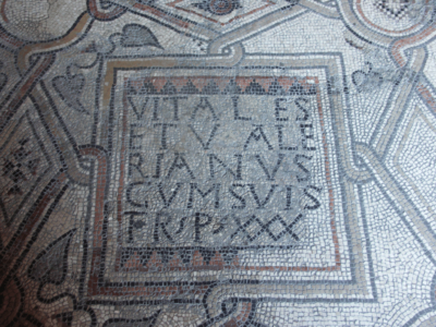 Christian votive inscription on the mosaic floor of the Basilica S. Eufemia in Grado, stating the number of pedes which had been donated by Vitales and Valerianus. CIL V 1612 = Inscr. Aquil. III 3358; Date: Around AD 580; © C. Witschel.