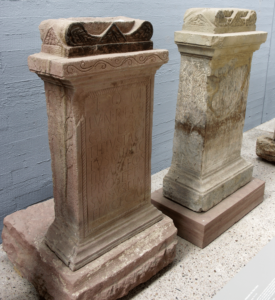 Two altars with votive inscriptions from the sanctuary of the beneficiarii consularis at Osterburken. AE 1985, 693 (left) and AE 1985, 696 (right); Date: AD 174 and second half of 2nd c. AD; Present Location: Römermuseum Osterburken; © C. Witschel.